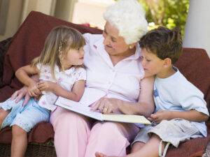 Grandma reading to grandkids